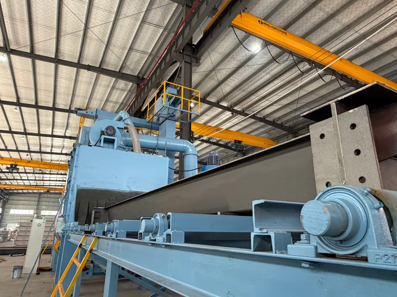 Conveyor rollers and drive motor on the HENER shot-blasting equipment